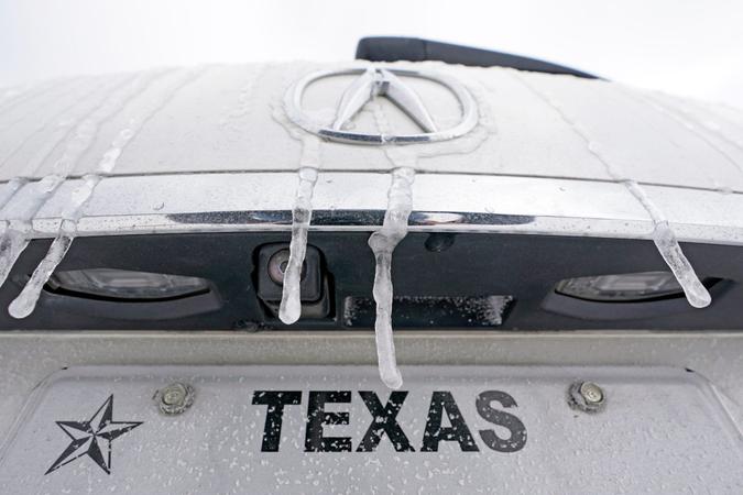 Mandatory Credit: Photo by David J Phillip/AP/Shutterstock (11760600u)Icicles hang on the back of a vehicle, in Houston.