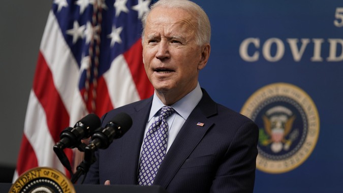 Mandatory Credit: Photo by Evan Vucci/AP/Shutterstock (11776013z)President Joe Biden speaks during an event to commemorate the 50 millionth COVID-19 shot, in the South Court Auditorium on the White House campus, in WashingtonBiden, Washington, United States - 25 Feb 2021.