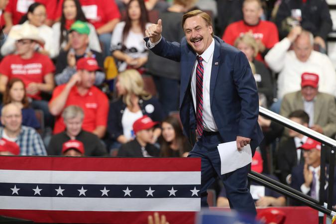 Mandatory Credit: Photo by Jim Mone/AP/Shutterstock (9915903b)Mike Lindell, inventor and founder of My Pillow, gives a thumbs up before a rally address by President Donald Trump, in Rochester, MinnElection 2018 Trump, Rochester, USA - 04 Oct 2018.