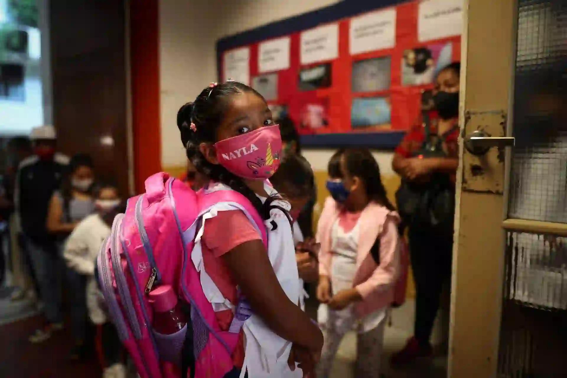 ATTENTION: This Image is part of a PHOTO SETMandatory Credit: Photo by JUAN IGNACIO RONCORONI/EPA-EFE/Shutterstock (11763342k)Several students wait to enter in their classroom at a school in Buenos Aires, Argentina, 17 February 2021.