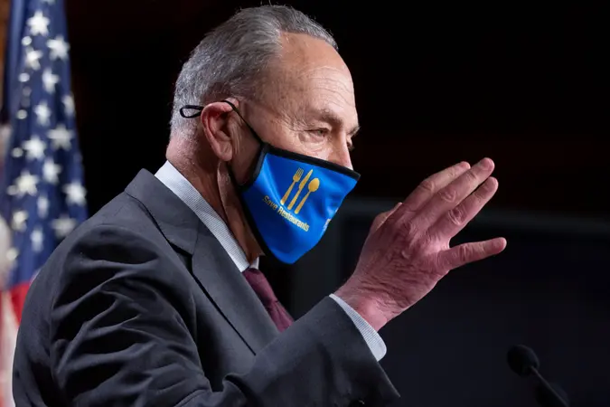 Mandatory Credit: Photo by MICHAEL REYNOLDS/EPA-EFE/Shutterstock (11773219a)Senate Majority Leader Chuck Schumer holds a news conference regarding COVID-19 economic stimulus relief legislation, on Capitol Hill in Washington, DC, USA, 23 February 2021.