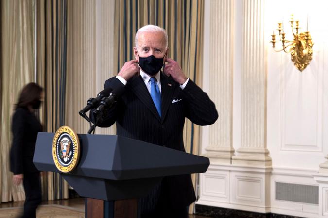 Mandatory Credit: Photo by DOUG MILLS/Shutterstock (11782938q)President Joe Biden delivers remarks on the ongoing COVID-19 pandemic in the State Dining Room of the White House.