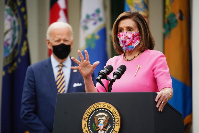 Mandatory Credit: Photo by JIM LO SCALZO/UPI/Shutterstock (11797831c)Speaker of the House Nancy Pelosi speaks before US President Joe Biden (L) delivers remarks on the American Rescue Plan from the Rose Garden of the White House in Washington DC on Friday, March 12, 2021.