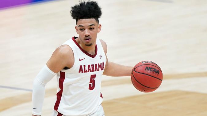 Mandatory Credit: Photo by Mark Humphrey/AP/Shutterstock (11800939d)Alabama's Jaden Shackelford plays against LSU during the championship game at the NCAA college basketball Southeastern Conference Tournament, in Nashville, TennAlabama Basketball, Nashville, United States - 14 Mar 2021.
