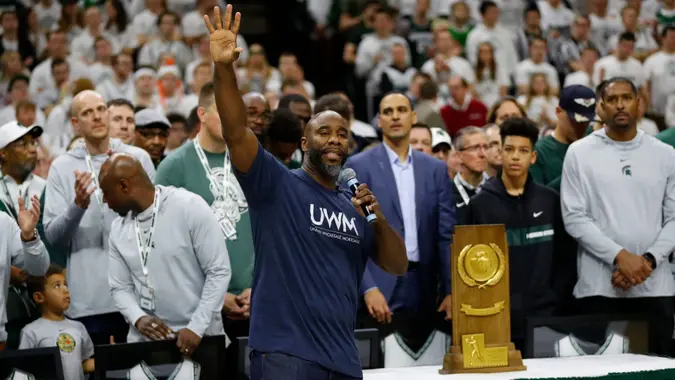 Mandatory Credit: Photo by Paul Sancya/AP/Shutterstock (10557905p)Mateen Cleaves waves to the crowd as the Michigan State 2000 national championship team is recognized during halftime of an NCAA college basketball game against Maryland in East Lansing, MichMaryland Michigan St Basketball, East Lansing, USA - 15 Feb 2020.