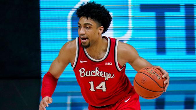 Mandatory Credit: Photo by Michael Conroy/AP/Shutterstock (11800949c)Ohio State forward Justice Sueing (14) plays against Illinois in an NCAA college basketball championship game at the Big Ten Conference tournament in IndianapolisOhio St Men's Basketball, Indianapolis, United States - 14 Mar 2021.