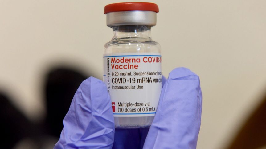 Mandatory Credit: Photo by Debbie Hill/UPI/Shutterstock (11791245a)A medic from Israel's Magen David Adam emergency agency holds a vial of Moderna??s COVID-19 vaccine at the Lamed Hei Checkpoint between Gush Etzion and Beit Shemesh, on Monday, March 8, 2021.