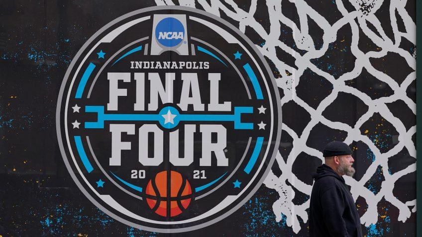 Mandatory Credit: Photo by Darron Cummings/AP/Shutterstock (11804196h)The NCAA Final Four logo for the NCAA college basketball tournament is painted on a window in downtown IndianapolisNCAA Tournament Fans Basketball, Indianapolis, United States - 17 Mar 2021.
