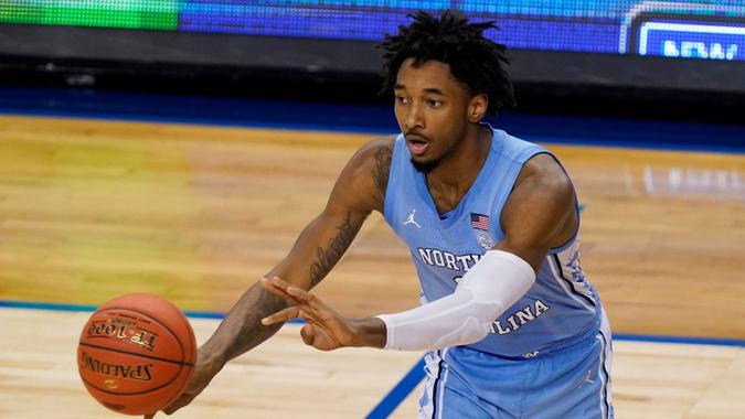 Mandatory Credit: Photo by Gerry Broome/AP/Shutterstock (11797207b)North Carolina guard Leaky Black (1) passes the ball during the second half of an NCAA college basketball game against Virginia Tech in the quarterfinal round of the Atlantic Coast Conference tournament in Greensboro, N.