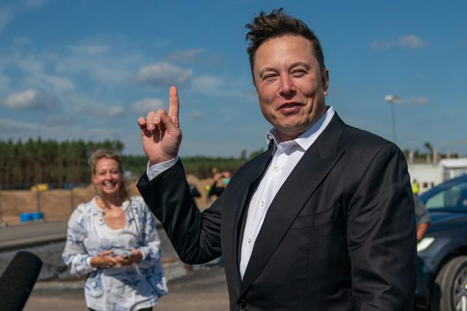 Mandatory Credit: Photo by ALEXANDER BECHER/EPA-EFE/Shutterstock (10764495b)Tesla and SpaceX CEO Elon Musk (R) gives a statement at the construction site of the Tesla Giga Factory in Gruenheide near Berlin, Germany, 03 September 2020.