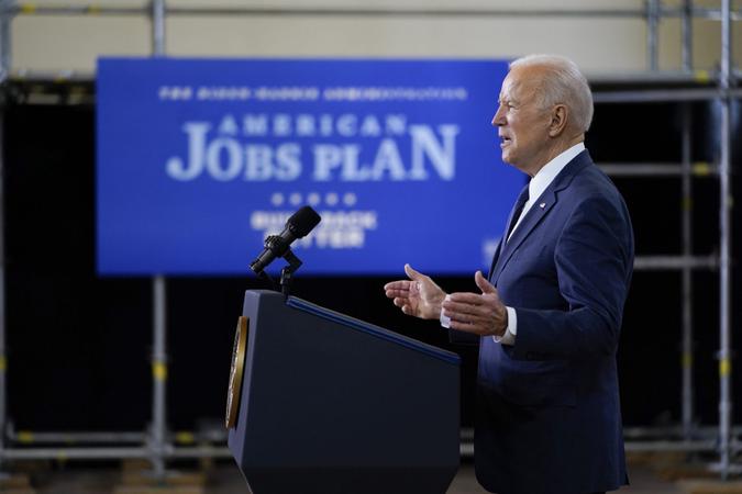 Mandatory Credit: Photo by Evan Vucci/AP/Shutterstock (11839941r)President Joe Biden delivers a speech on infrastructure spending at Carpenters Pittsburgh Training Center, in PittsburghBiden, Pittsburgh, United States - 31 Mar 2021.