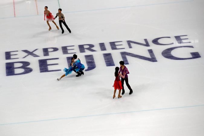 Mandatory Credit: Photo by Andy Wong/AP/Shutterstock (11841934e)Chinese figure skaters practice their routines at the Capital Indoor Stadium during a test event for the 2022 Beijing Winter Olympics in Beijing, .