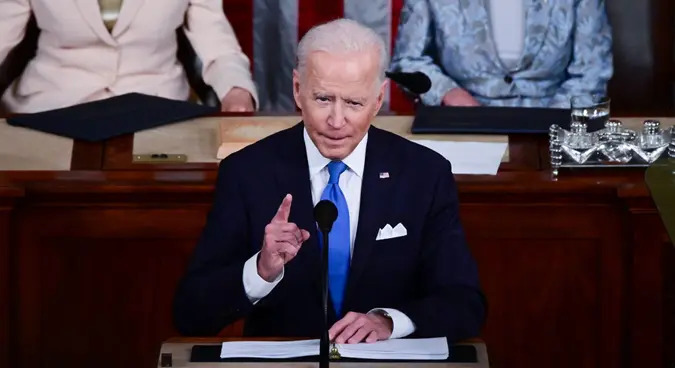 Mandatory Credit: Photo by Shutterstock (11880586f)US President Joe Biden addresses a joint session of Congress as US Vice President Kamala Harris (L) and Speaker of the United States House of Representatives Nancy Pelosi (D-CA) react at the US Capitol in Washington, DCBiden Delivers his First Address to a Joint Session of Congress, Washington, District of Columbia, USA - 28 Apr 2021.