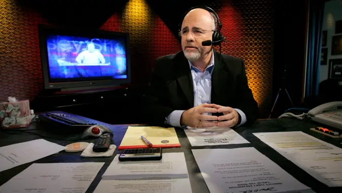 Mandatory Credit: Photo by Mark Humphrey/AP/Shutterstock (6378435d)Dave Ramsey Financial talk show host Dave Ramsey works in his broadcast studio in Brentwood, Tenn.