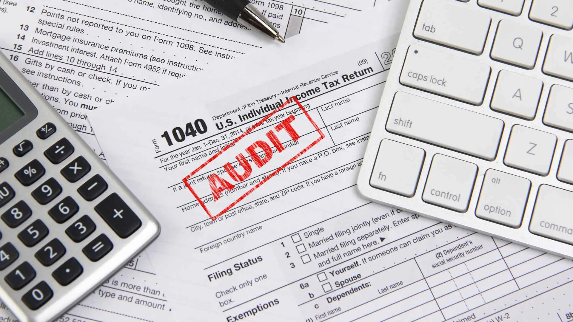 Concept image for filing federal income taxes online and being audited.