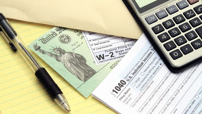 Tax forms with Treasury check.