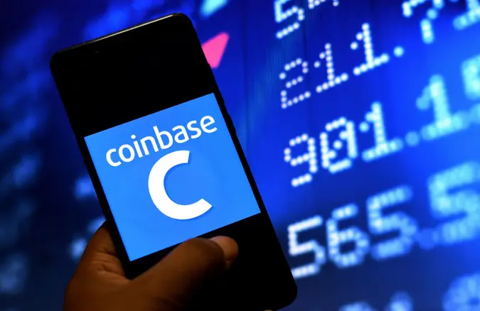 Mandatory Credit: Photo by Avishek Das/SOPA Images/Shutterstock (11863354e)In this Photo illustration of a Coinbase logo seen displayed on a Smartphone.