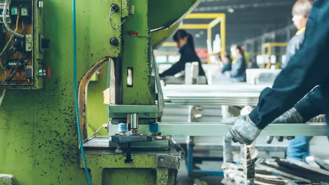 Detail shot of extruded aluminum industry in a plant stock photo
