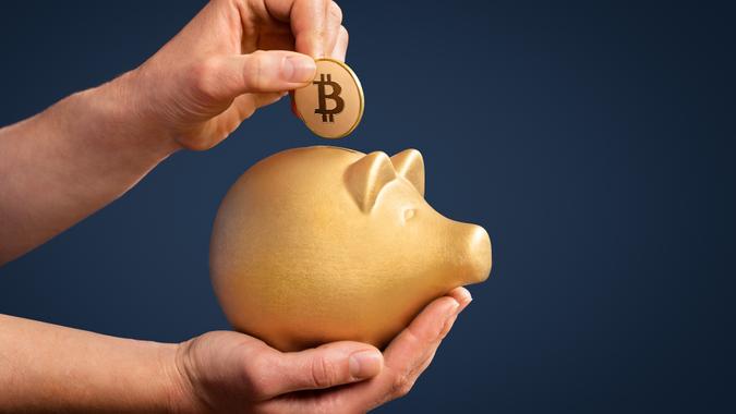 Investing savings in bitcoin is gold stock photo