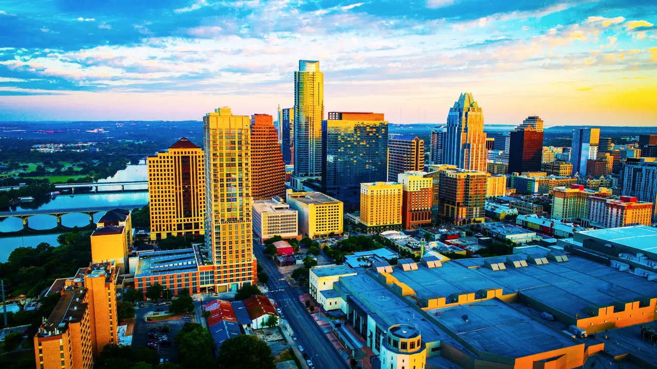 Colorful sunrise of modern urban skyline of Austin Texas USA