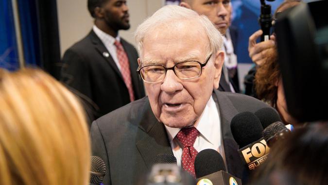 Mandatory Credit: Photo by Nati Harnik/AP/Shutterstock (10228126b)Warren Buffett, Chairman and CEO of Berkshire Hathaway, speaks to reporters during a tour of the CHI Health convention center where various Berkshire Hathaway companies display their products, before presiding over the annual shareholders meeting in Omaha, Neb.