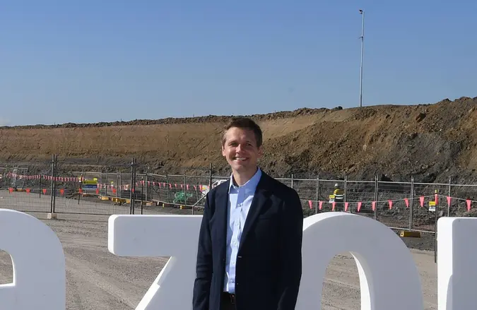 Mandatory Credit: Photo by DEAN LEWINS/EPA-EFE/Shutterstock (10695137g)Amazon's Country Manager Matt Furlong stands in front of a sign after a press conference at an Amazon warehouse construction site in Kemps Creek, Sydney, Australia, 30 June 2020.