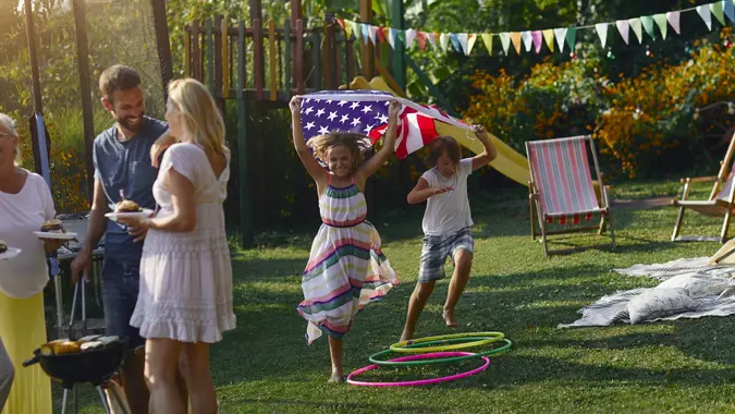 Multi-generation Family Celebrating 4th of July stock photo