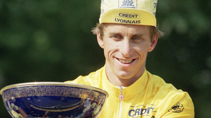 Mandatory Credit: Photo by Laurent Rebours/AP/Shutterstock (7275283a)United Statuss Greg LeMond reacts as he holds the cup after his victory in the Tour de France classic at the end of the last stage, Paris, FranceGreg LeMond Tour de France 1990, Paris, France.