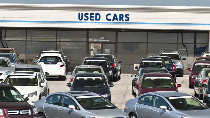 Alcoa, Tennessee, USA - April 10, 2011: The used car lot of a Honda dealer is dominated by late model used Hondas with a banner proclaiming them to be certified, that is to have a full Honda warranty.