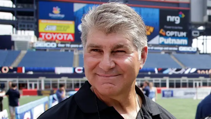 Mandatory Credit: Photo by Stephan Savoia/AP/Shutterstock (6086679a)Ray Bourque Former Boston Bruins star Ray Bourque walks on the field during an event at Gillette Stadium in Foxborough, Mass.