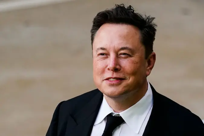 Mandatory Credit: Photo by Matt Rourke/AP/Shutterstock (12210290c)Elon Musk walks from the the justice center in Wilmington, Del.