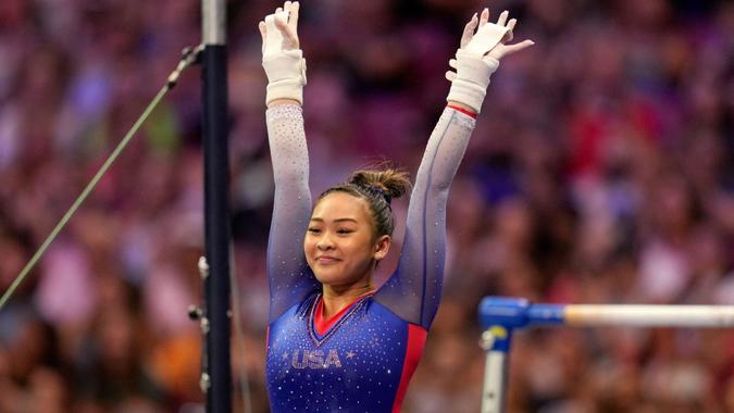 Mandatory Credit: Photo by Jeff Roberson/AP/Shutterstock (12170002l)Suni Lee reacts to her performance on the uneven bars during the women's U.