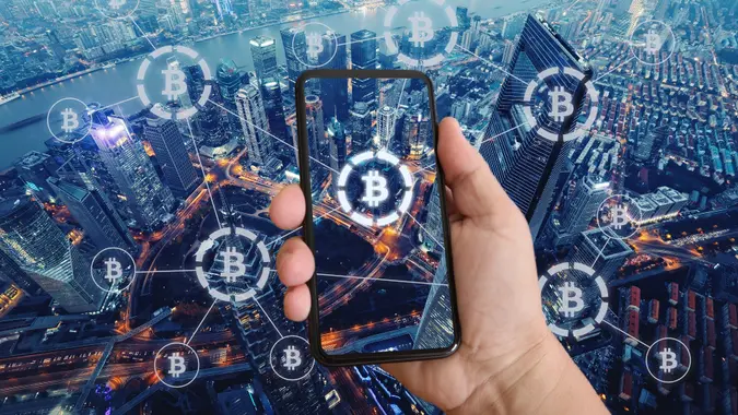 Bitcoin crypto currency blockchain network security technology mobile phone stock photo