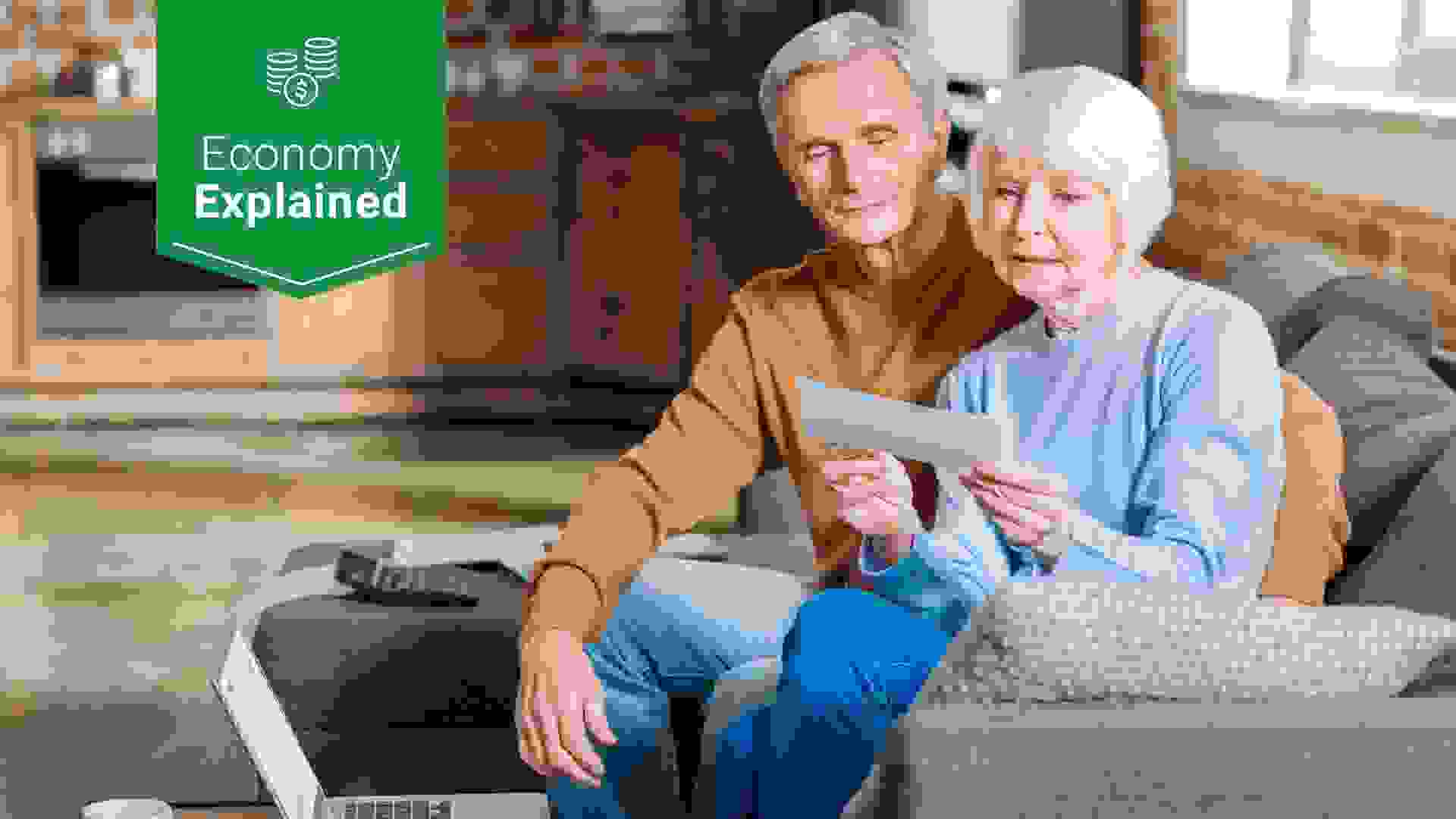 elderly couple receiving social security check