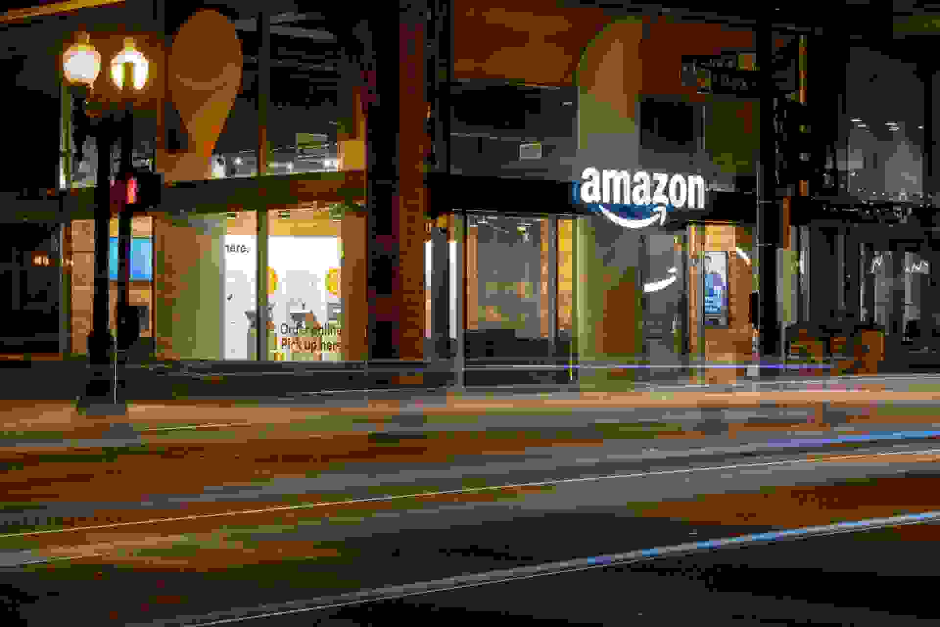 Chicago, USA Oct 8, 2018: Cars passing the Amazon E-commerce pick up store early in the night in the Loop.