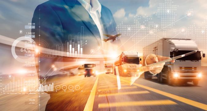 Double exposure of businessman and graph growth of business with world map of transportation and logistics network distribution and trucks of industrial cargo freight for shipping.