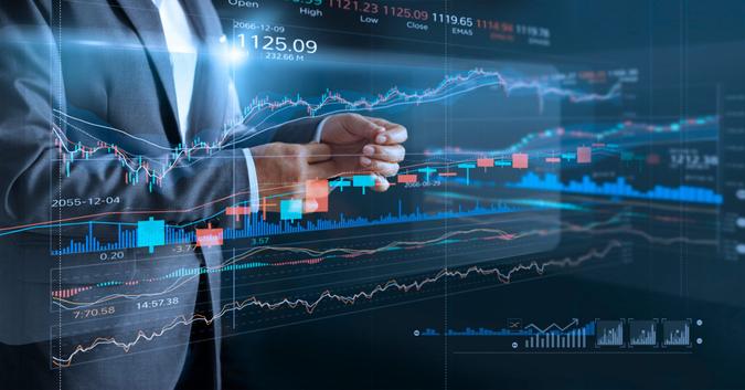 Businessman with virtual screen and data statistic index graph, analysis graph of stock market financial, stock exchange and stock market data concept.