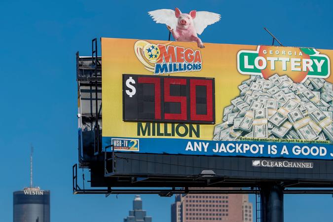Mandatory Credit: Photo by ERIK S LESSER/EPA-EFE/Shutterstock (11706057b)A billboard displays the Mega Millions multi-state lottery jackpot in Atlanta, Georgia, USA, 13 January 2021.