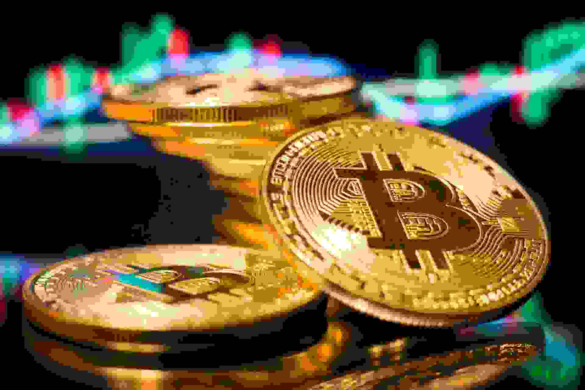 Bitcoin gold coins in a close-up shot, digital currency concept.