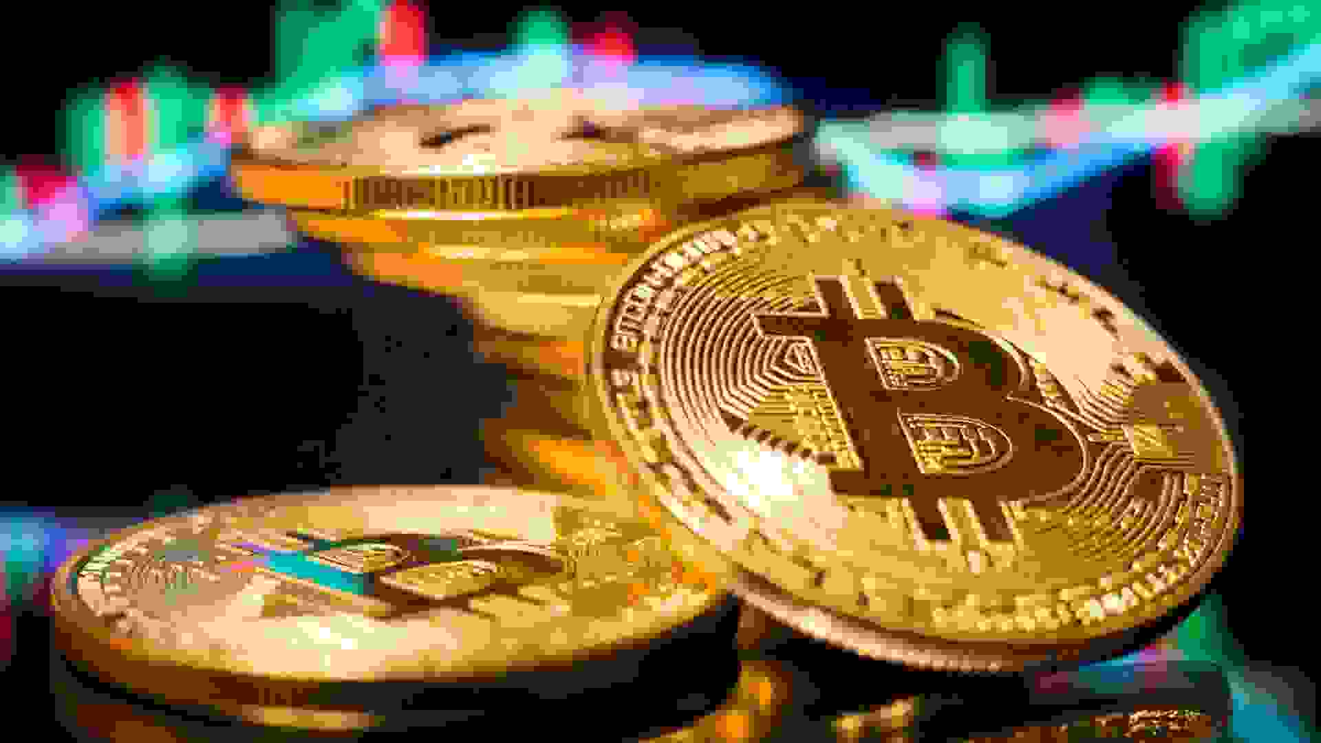 Bitcoin gold coins in a close-up shot, digital currency concept.