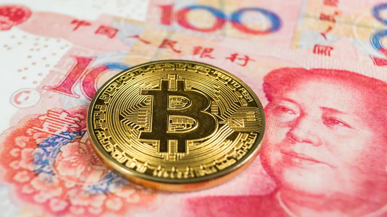 Crypto currency concept - A Bitcoin with Chinece currency RMB, Renminbi.