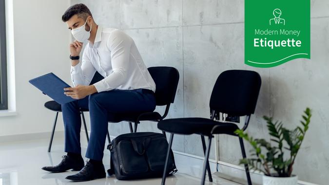 Businessman wearing protective face mask while waiting or job interview. stock photo
