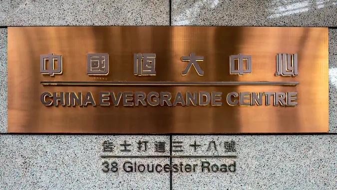 Mandatory Credit: Photo by Katherine Cheng/SOPA Images/Shutterstock (12455130f)China Evergrande Centre sign seen on the front of their building.