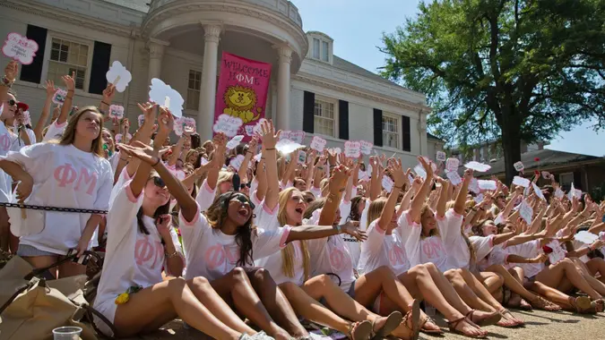 Mandatory Credit: Photo by Brynn Anderson/AP/Shutterstock (6118876n)The University of Alabama Phi Mu's newest sorority members, in front, gather at sorority house for a photograph during Bid Day, in Tuscaloosa, Ala.