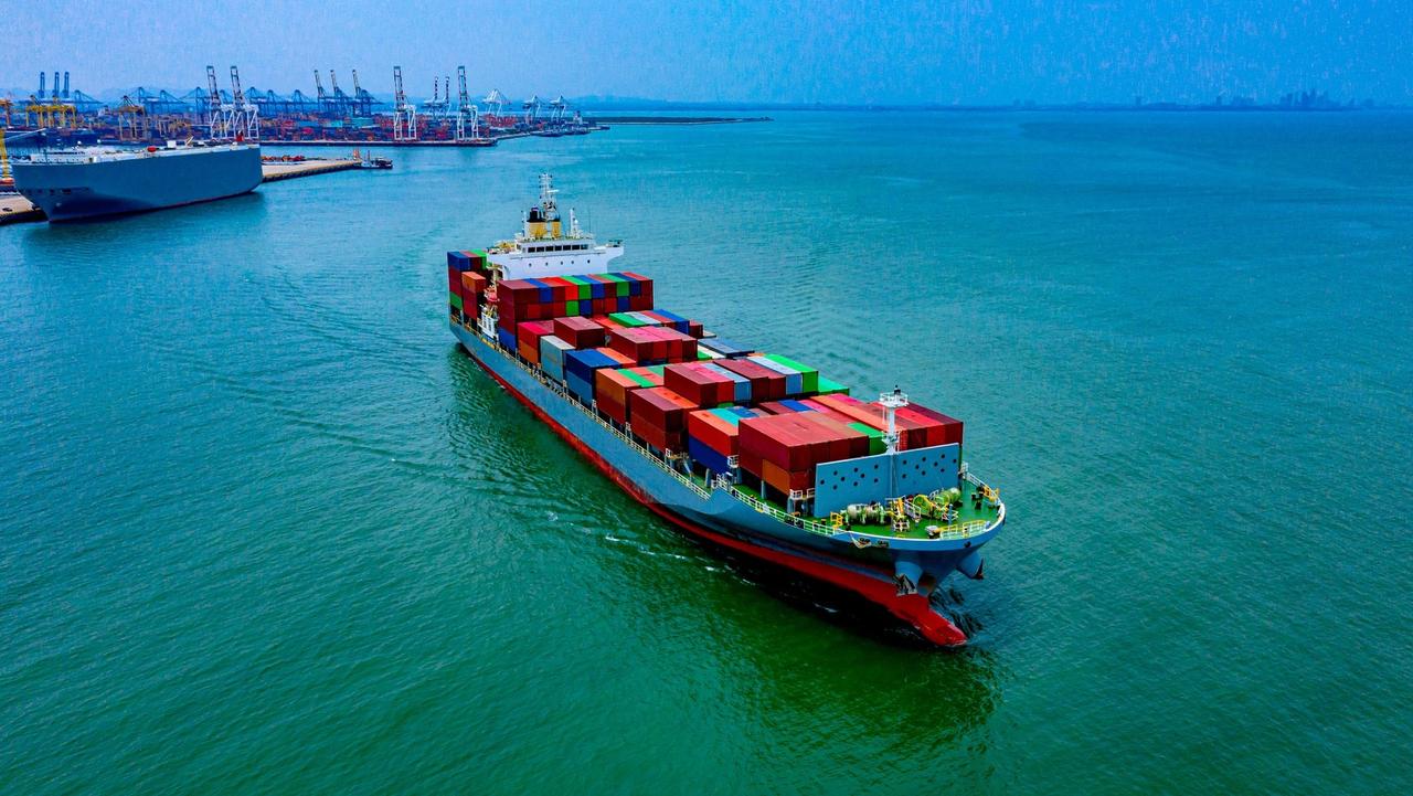 Cargo containers ship logistics transportation Container Ship Vessel Cargo Carrier. import export logistic international export and import services export products worldwide stock photo