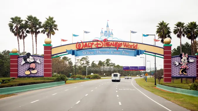 Orlando, Florida, USA - November 25, 2013: Walt Disney World main entrance sign as seen driving from the south on World Drive into the park.