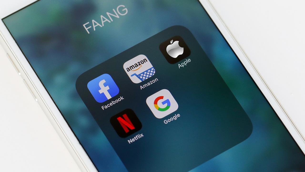 Tel Aviv, ISRAEL - May 28 2020 : FAANG Big Tech icons (Facebook, Amazon, Apple, Netflix & Google). FAANG is an acronym Of the 5 strong stocks in the Nasdaq technology stocks index. stock photo