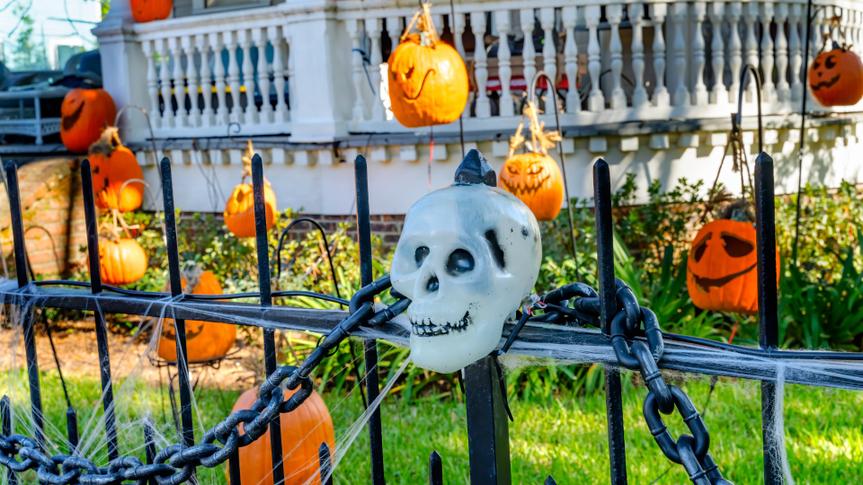 Halloween Pumpkins Decorations Black Iron Gate Fence Garden District New Orleans Louisiana. National Historic District built in the 1800s