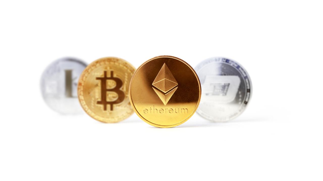 Baku, Azerbaijan - September 14, 2020: Set of popular cryptocurrencies focused on Ethereum coin.