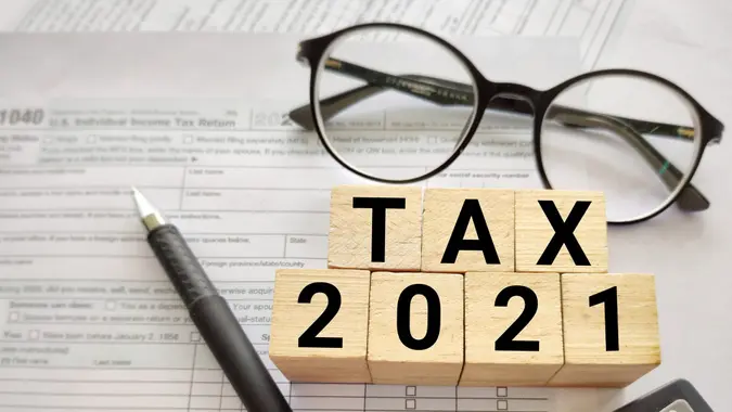 TAX 2021 text on wooden blocks.